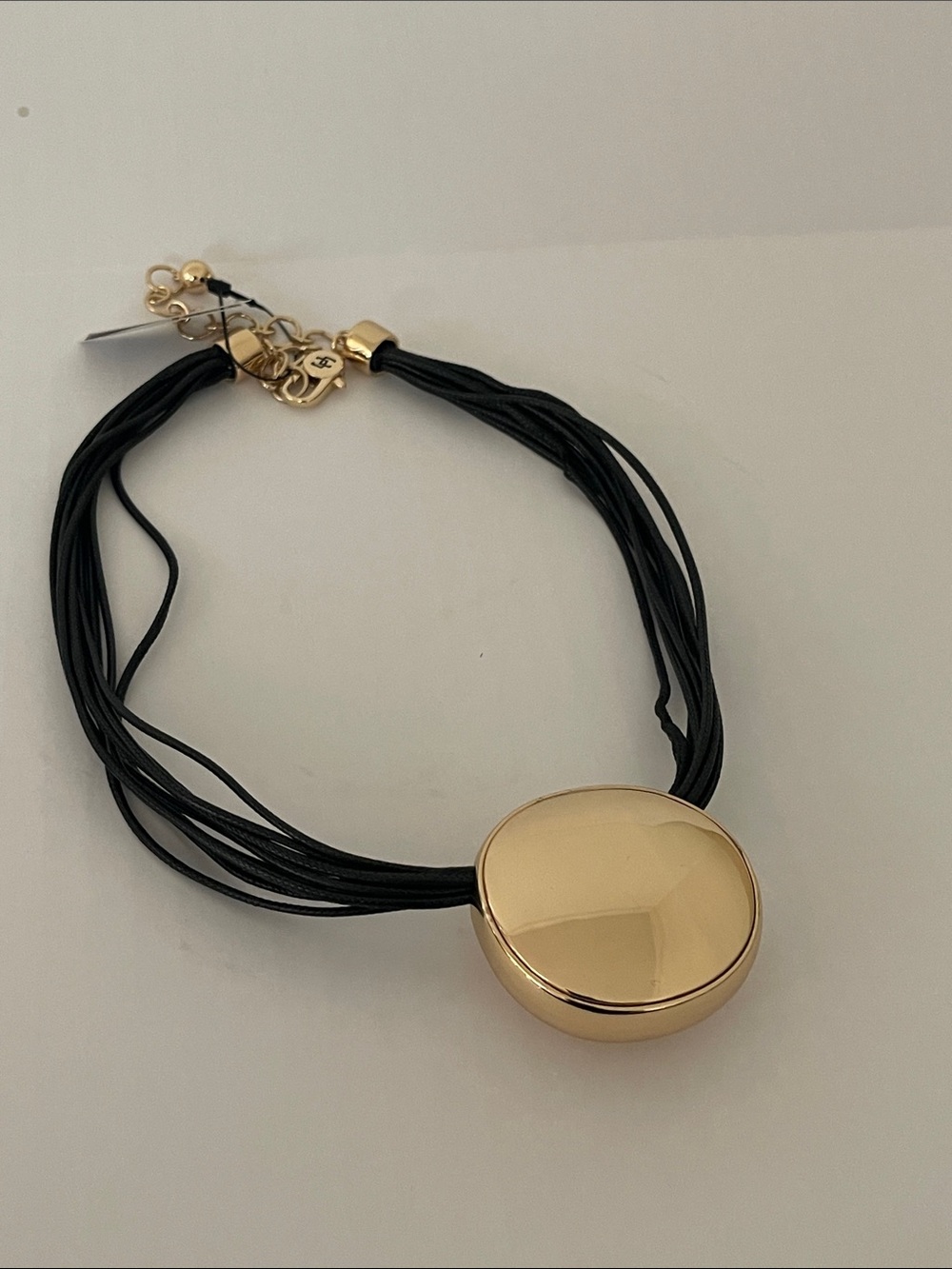 Chico's Black Multi-Strand Cord Necklace with Gold Disc Pendant